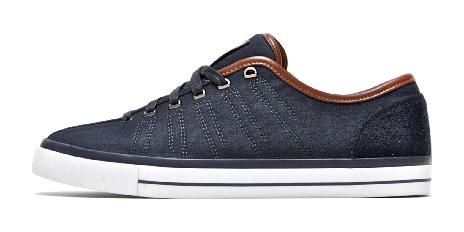 The CA Classic low in navy canvas with a brown leather collar.