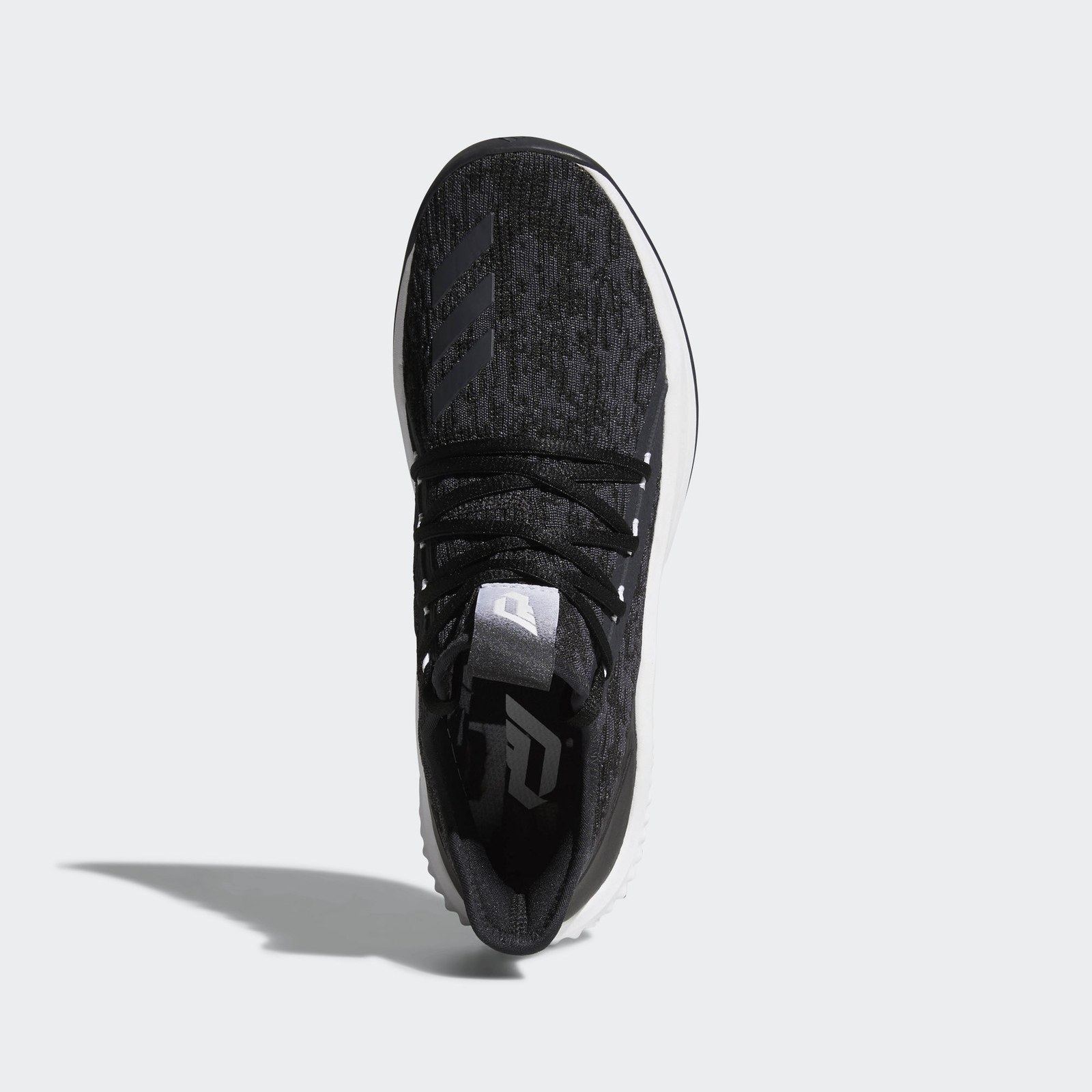 Top view of the core black shoe, with a white D logo on the insole.