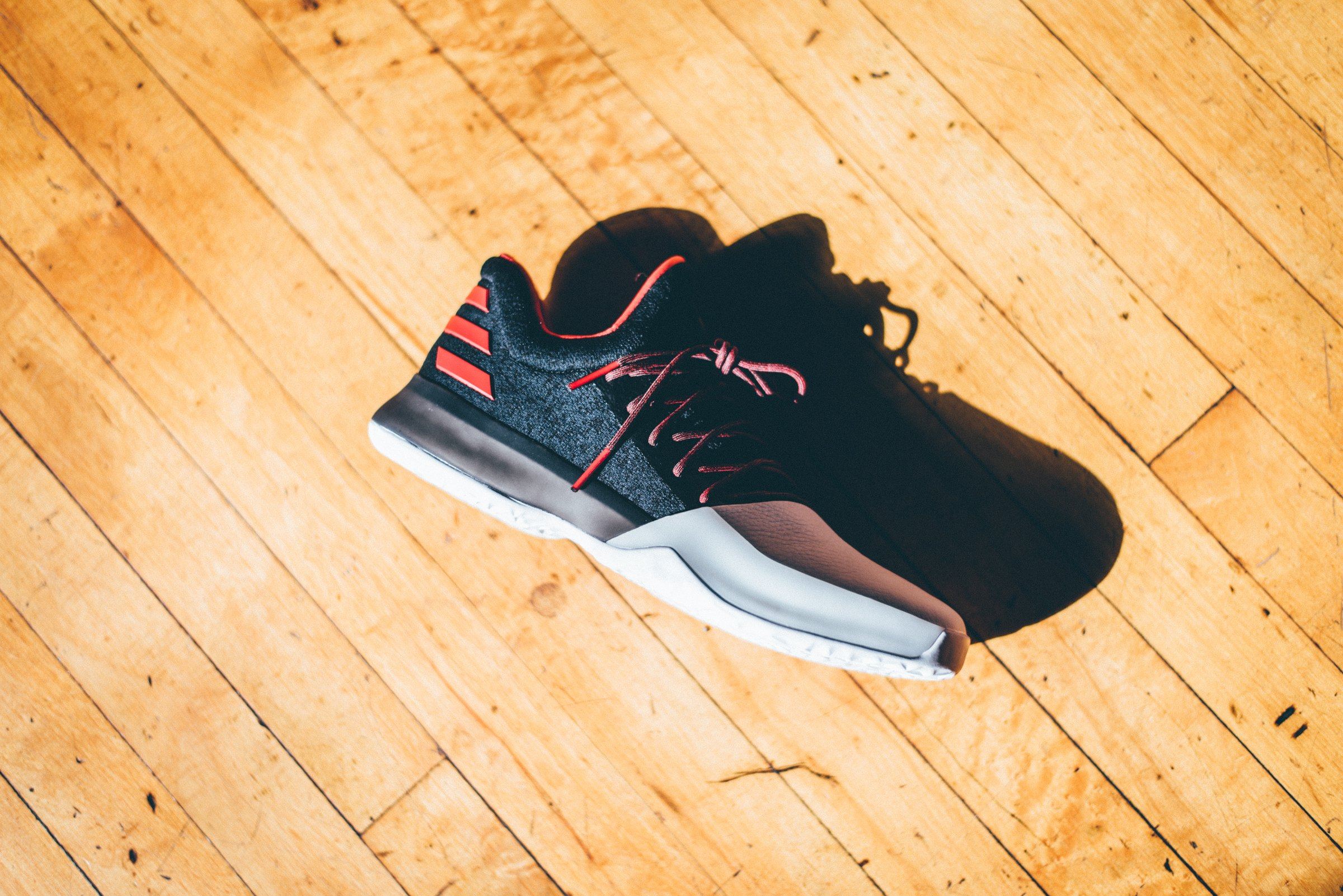 Overhead view of the shoe on hardwood, lateral side.