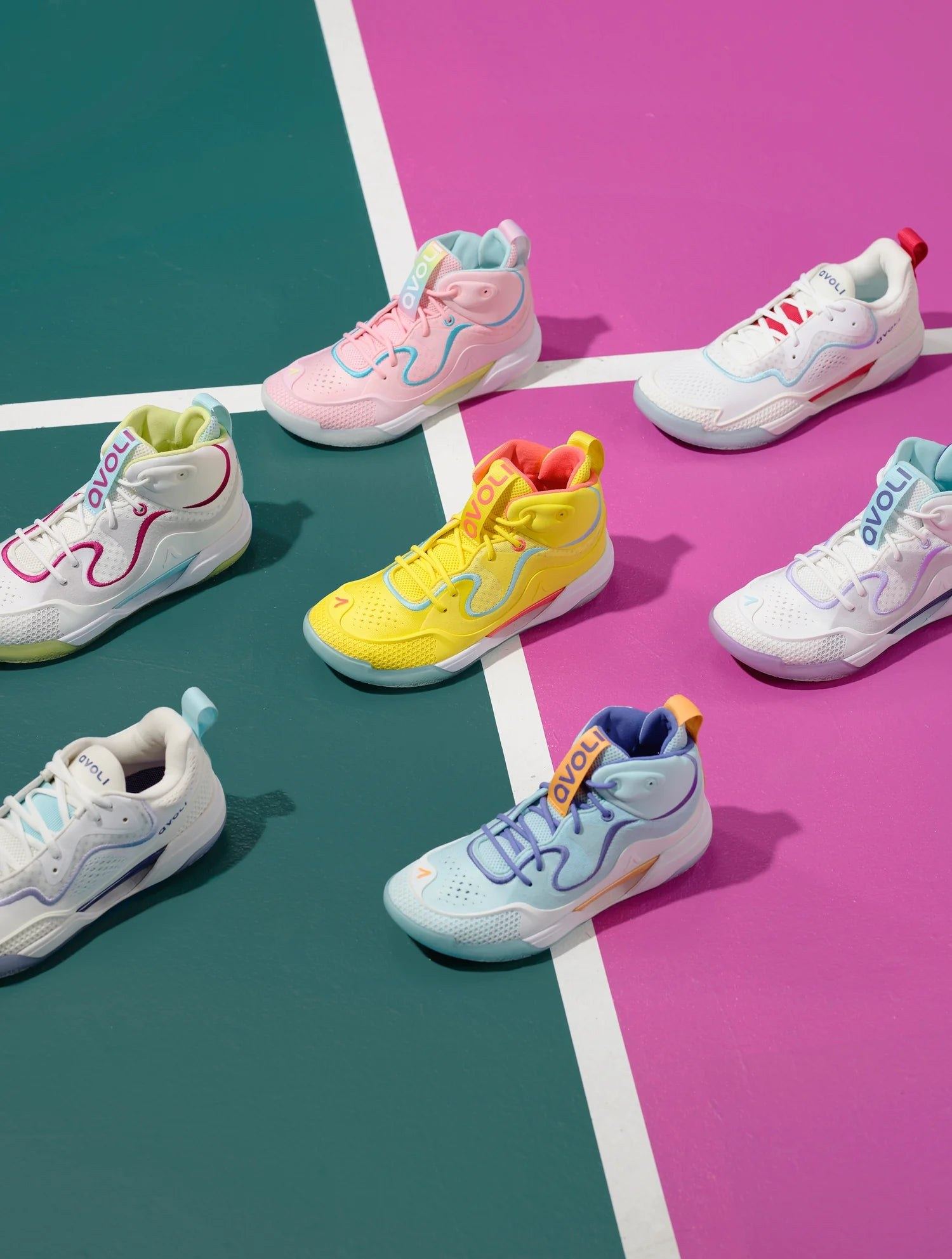 Avoli shoes in several colorways arranged on a green and magenta court.